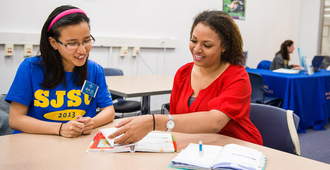 A student is getting assistance from a advisor