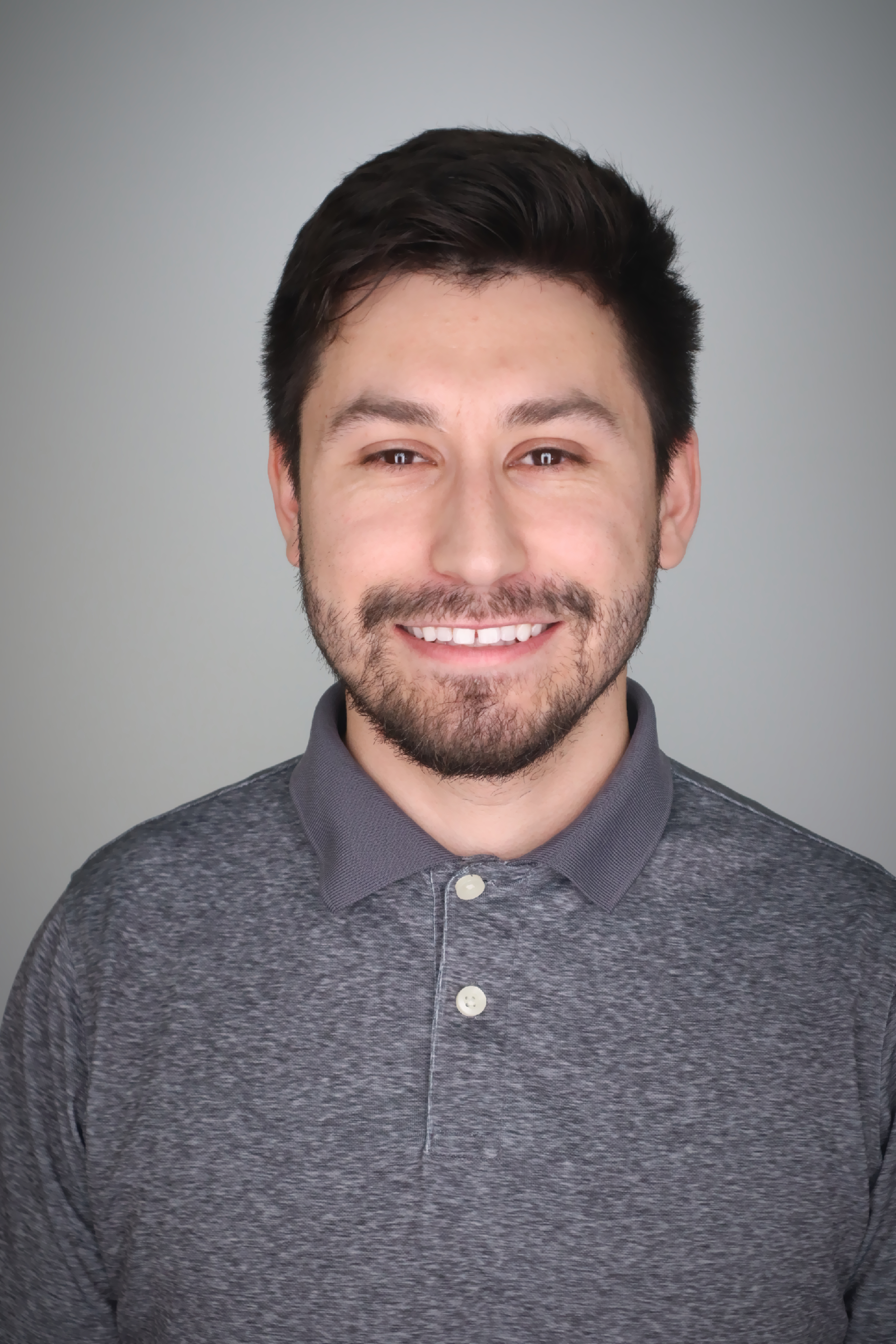 Adrian smiles